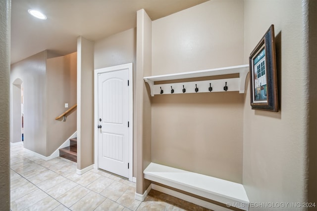 mudroom with light tile patterned floors