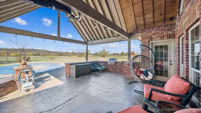 view of patio featuring a gazebo and area for grilling