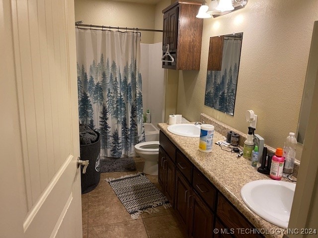 full bathroom with tile patterned flooring, shower / bath combo, vanity, and toilet