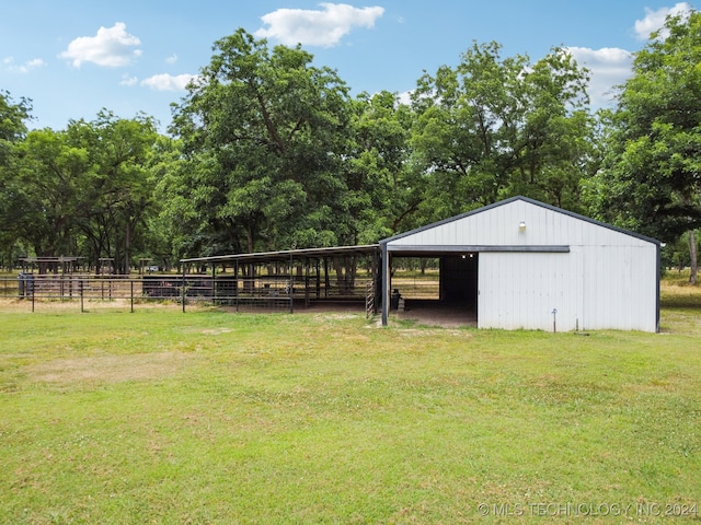 exterior space with a rural view and a lawn