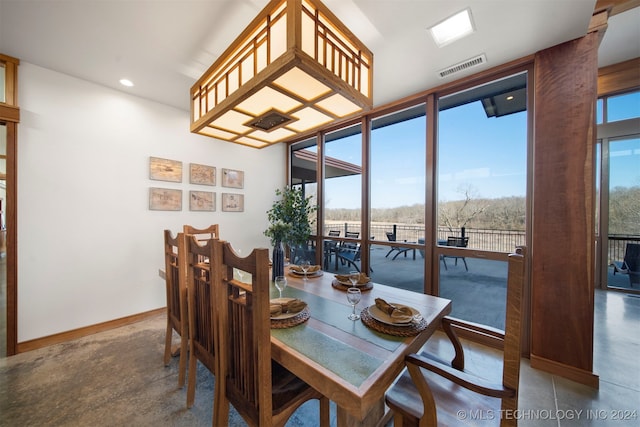 dining room featuring concrete floors