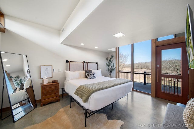 bedroom with access to exterior and concrete flooring