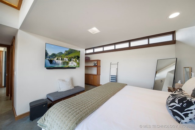 bedroom featuring multiple windows