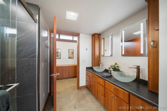 bathroom featuring vanity and concrete floors