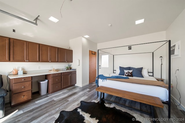 bedroom featuring light wood-type flooring