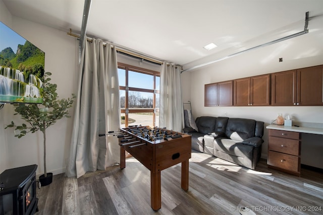 game room with hardwood / wood-style floors