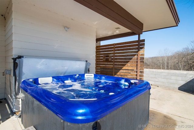 view of patio featuring a hot tub