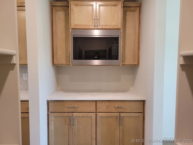 kitchen with light stone counters