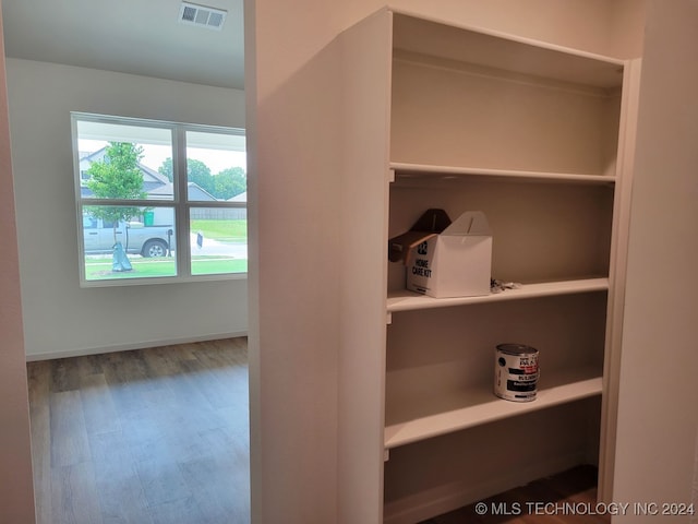 interior details featuring hardwood / wood-style floors