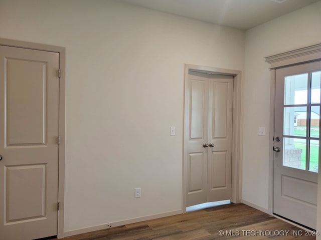 doorway featuring hardwood / wood-style floors