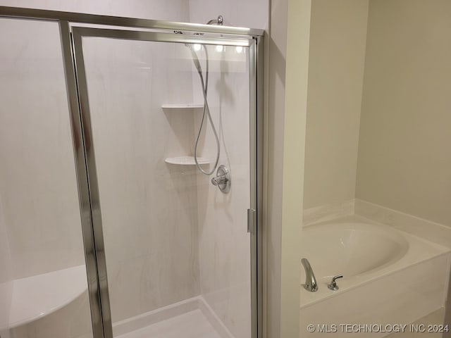 bathroom with independent shower and bath