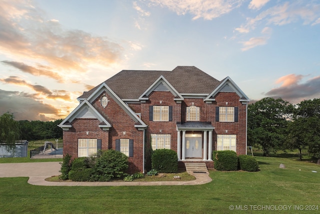 craftsman inspired home with a lawn