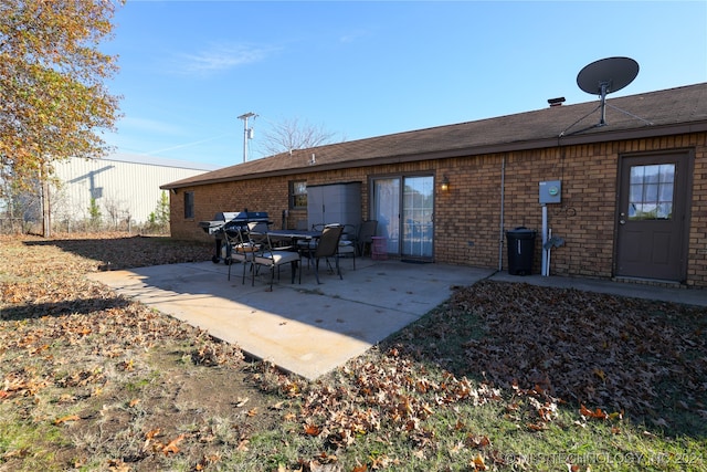 back of house featuring a patio