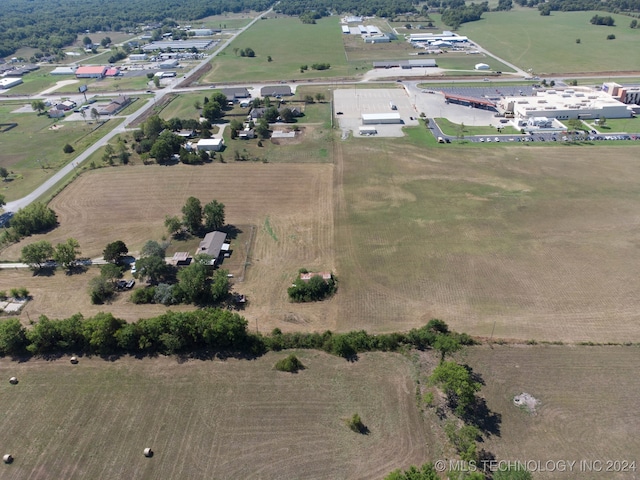 birds eye view of property featuring a rural view