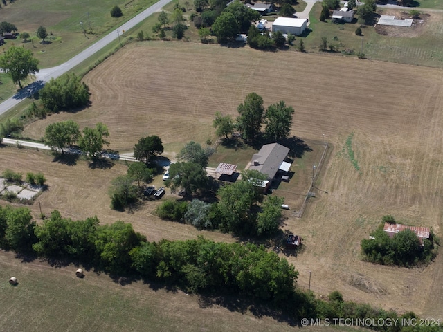 birds eye view of property with a rural view