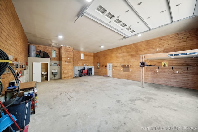 garage featuring wooden walls