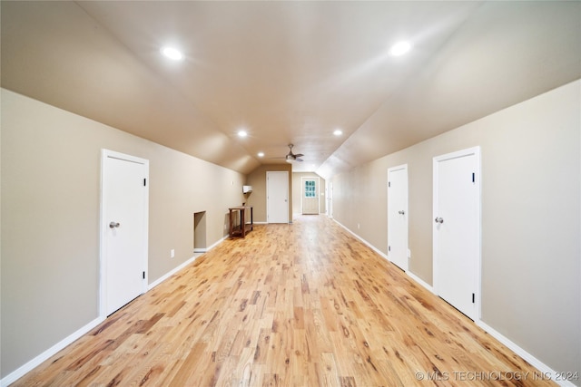 bonus room featuring ceiling fan, vaulted ceiling, and light hardwood / wood-style floors