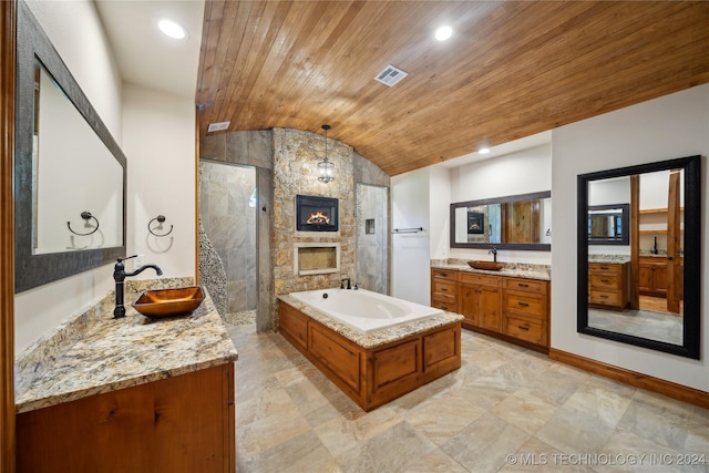 bathroom featuring lofted ceiling, vanity, wood ceiling, and separate shower and tub