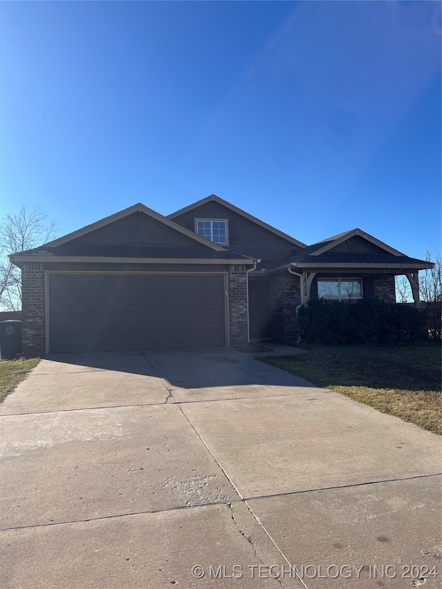 single story home with a garage