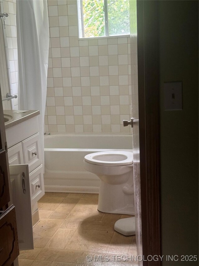 26385 State Highway 1 E, Allen, OK 74825 - full bath with vanity, shower / tub combo, and toilet