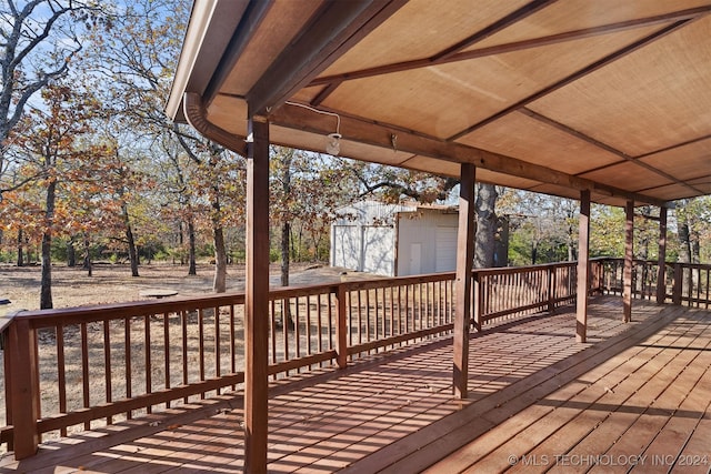 wooden deck with a storage unit