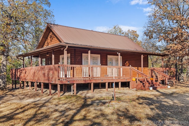 view of front of property with a wooden deck