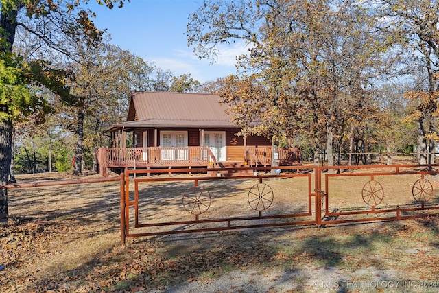 view of front of house featuring a deck