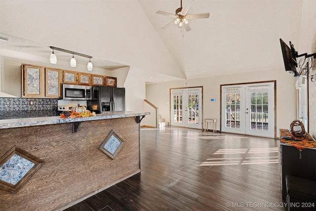 kitchen with high vaulted ceiling, black refrigerator with ice dispenser, french doors, dark hardwood / wood-style floors, and ceiling fan