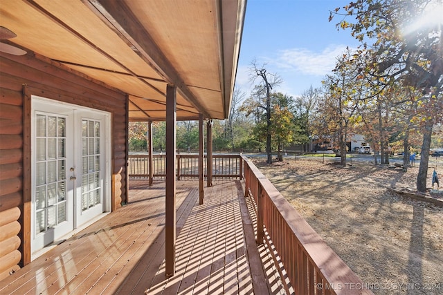 wooden deck featuring french doors