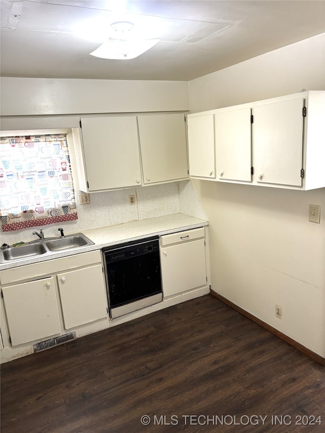 kitchen featuring black dishwasher, dark hardwood / wood-style floors, white cabinetry, and sink