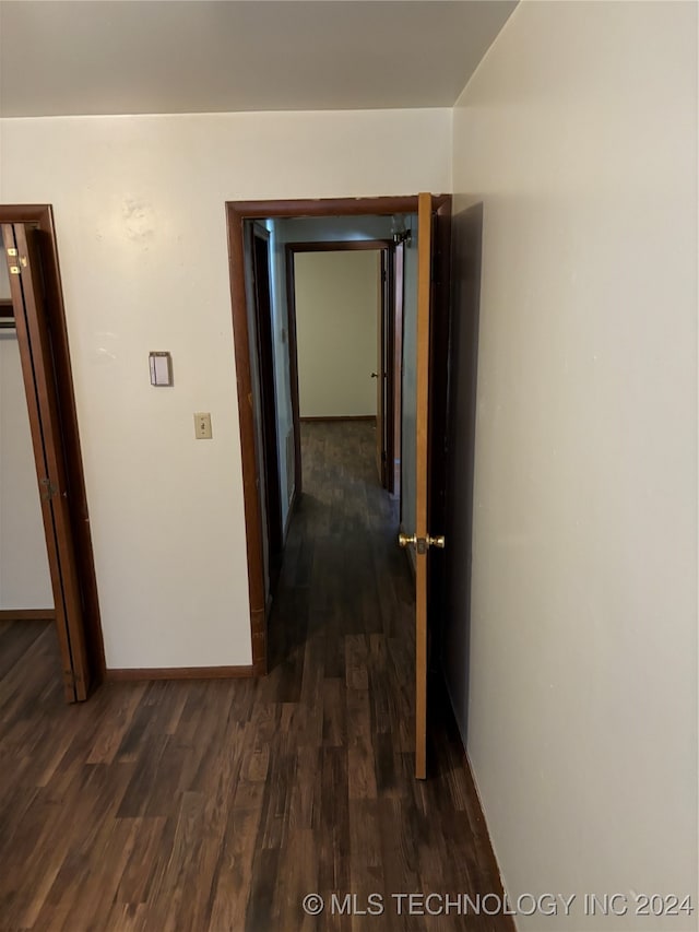 hall featuring dark hardwood / wood-style floors