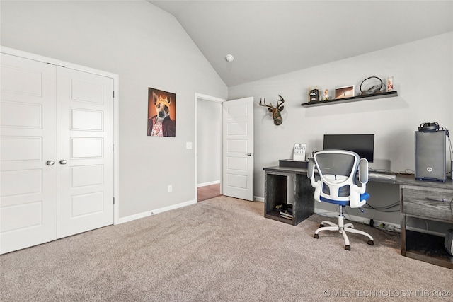 office featuring lofted ceiling and carpet floors