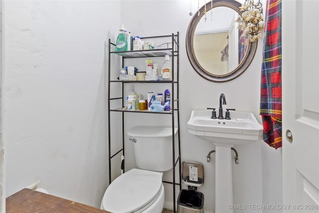 bathroom featuring toilet