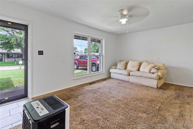 47 S 204th E Ave, Tulsa, OK 74108 - living area with a ceiling fan and carpet floors