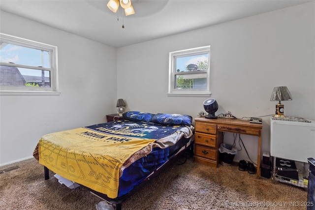 47 S 204th E Ave, Tulsa, OK 74108 - carpeted bedroom with ceiling fan