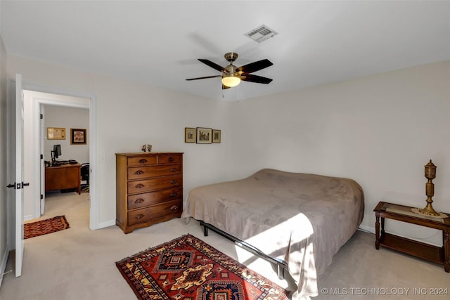 bedroom featuring ceiling fan and light colored carpet