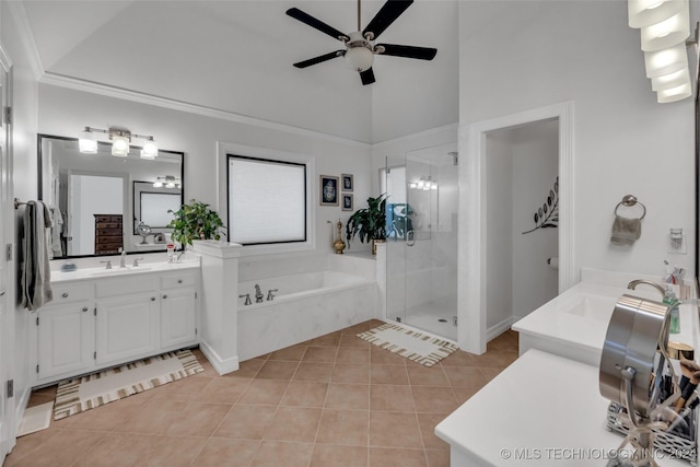 bathroom with ceiling fan, plus walk in shower, tile patterned floors, and vanity