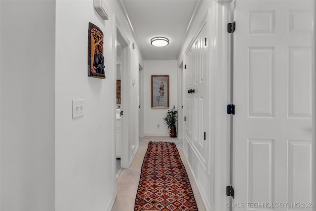 hallway with ornamental molding