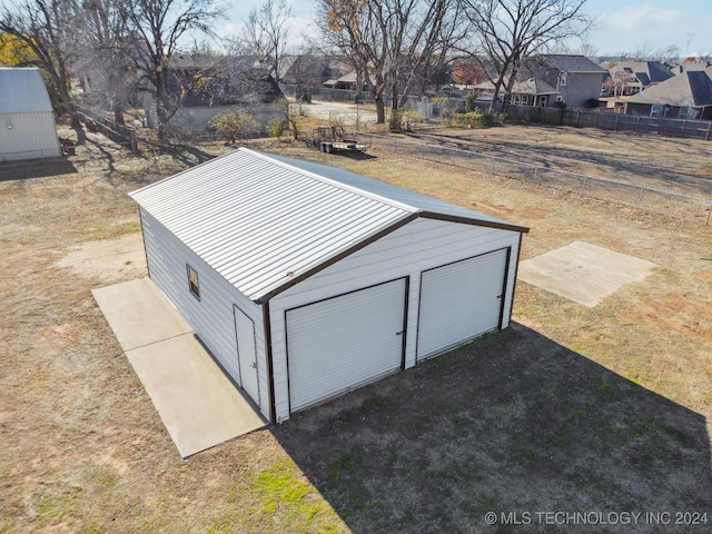 view of outbuilding featuring a garage