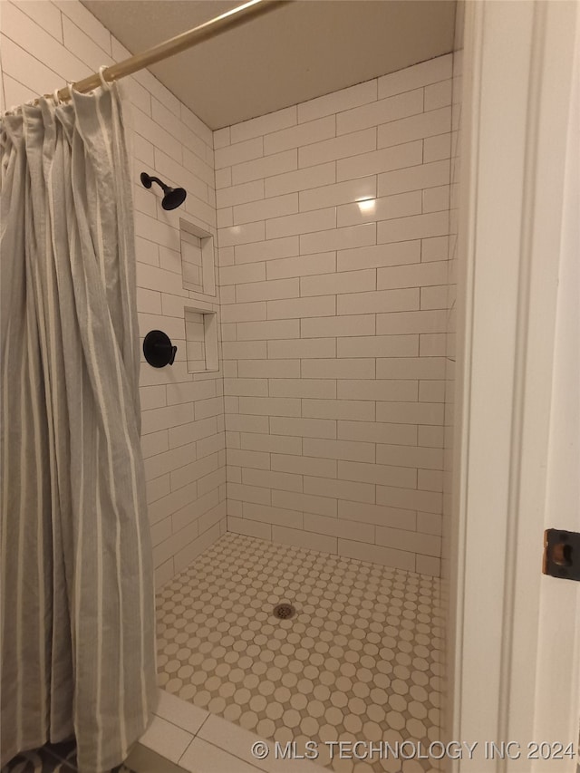 bathroom featuring walk in shower