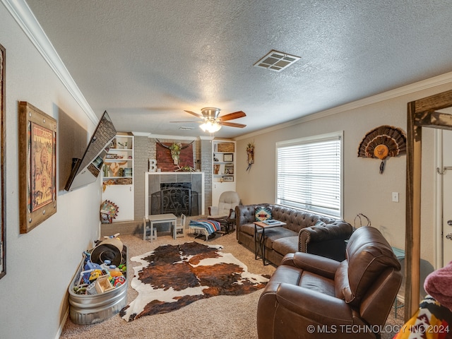 living room with crown molding, carpet floors, and a textured ceiling