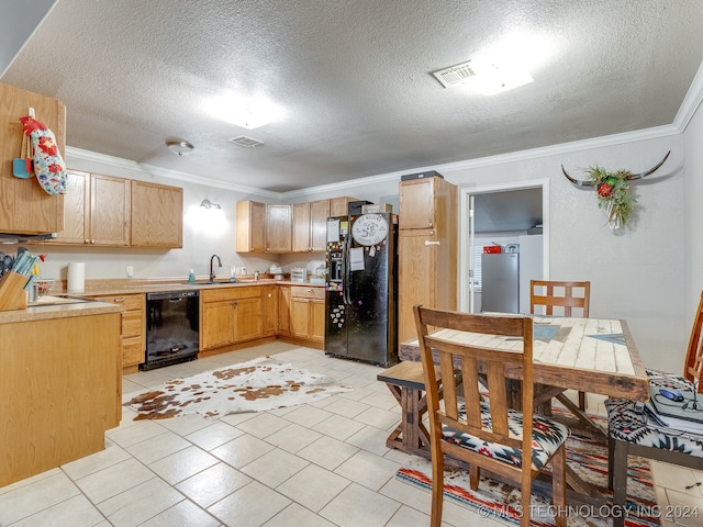 kitchen featuring crown molding, sink, black appliances, and a textured ceiling