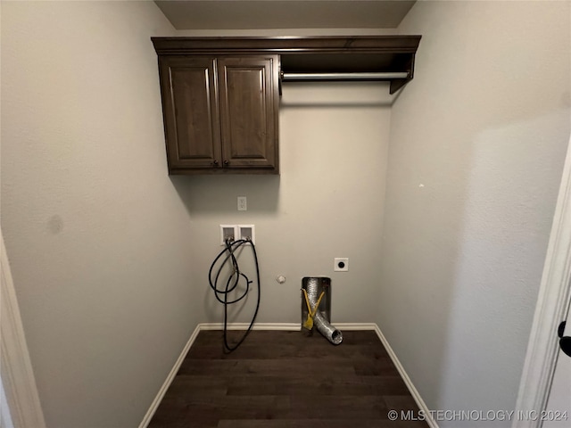 washroom featuring hookup for an electric dryer, dark hardwood / wood-style flooring, cabinets, and hookup for a washing machine