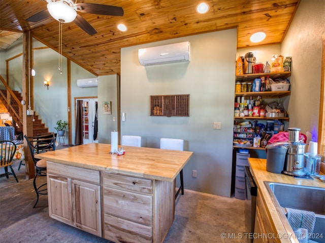 kitchen featuring a wall mounted air conditioner, light brown cabinets, wooden ceiling, butcher block countertops, and a kitchen island