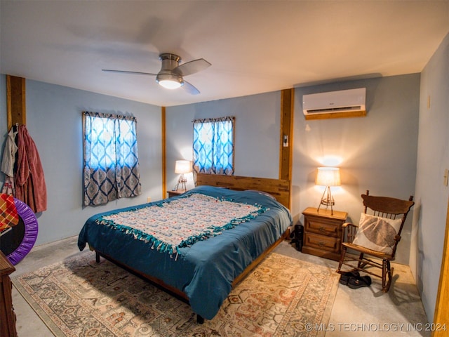 bedroom with ceiling fan, carpet floors, and a wall unit AC