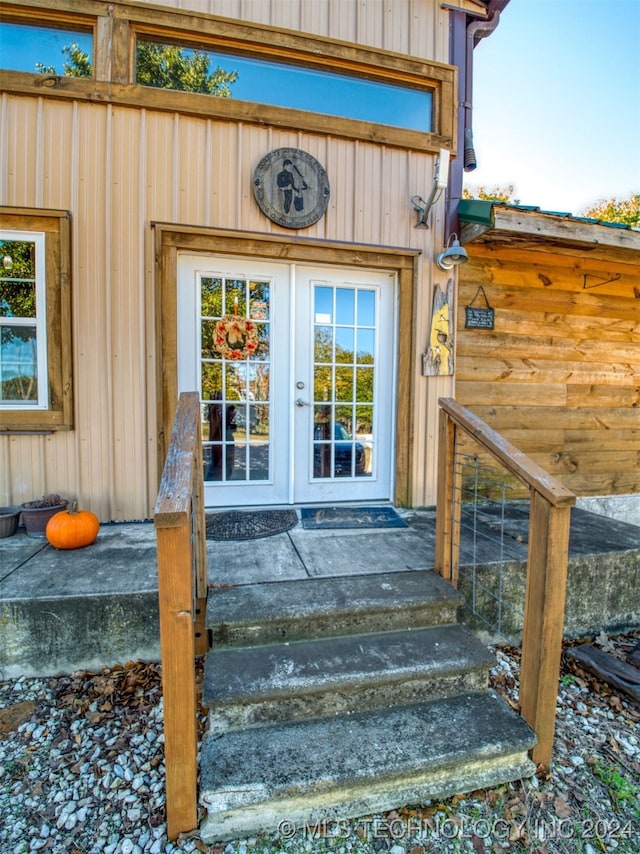 entrance to property featuring french doors