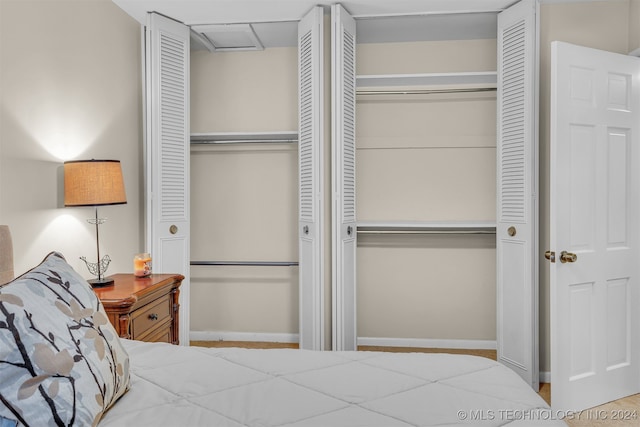 bedroom featuring multiple closets