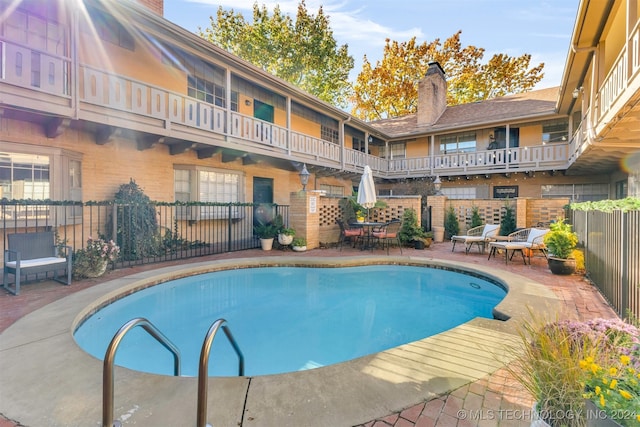 view of pool with a patio