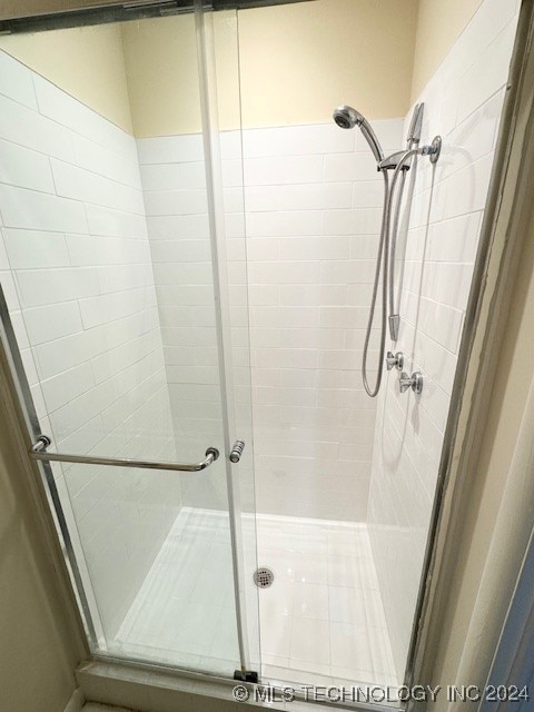 bathroom with an enclosed shower