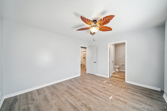 empty room featuring light hardwood / wood-style floors and ceiling fan